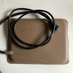 Outdoor small animal heated pad
